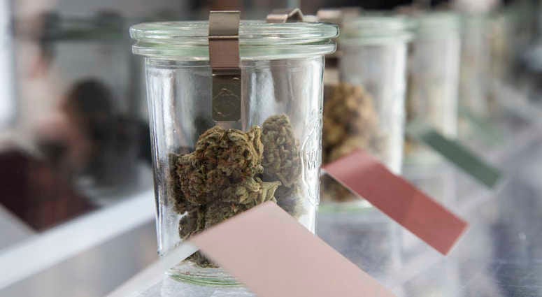 Cannabis sits in a display case at Harmony Dispensary in Secaucus, NJ. Cannabis Harmony Dispensary
